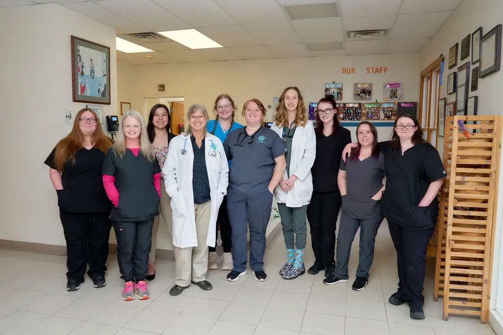 Veterinary staff poses in the lobby inside Dublin Animal Hospital in Dublin, Virginia.